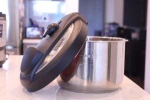 Instant pot lid and inner pot on a counter