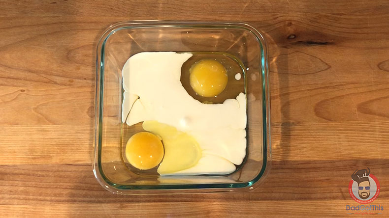 Eggs and heavy cream in a glass bowl for making french toast