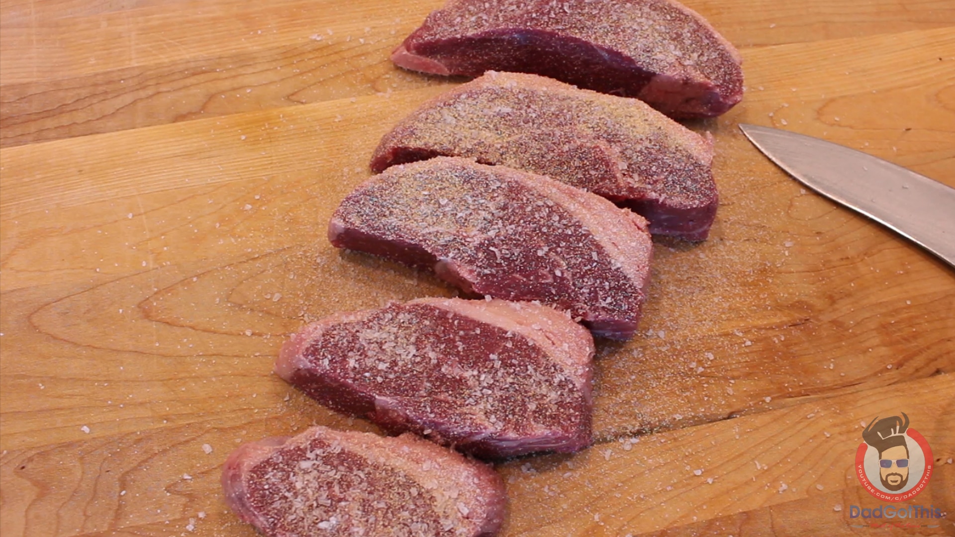 seasoned picanha steaks on a cutting board