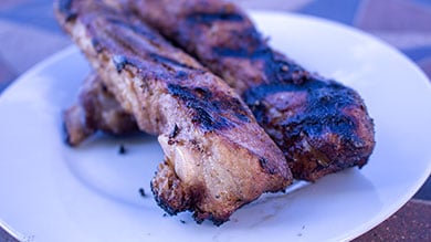 Spare Ribs that were Sous Vide then Grilled on a white plate