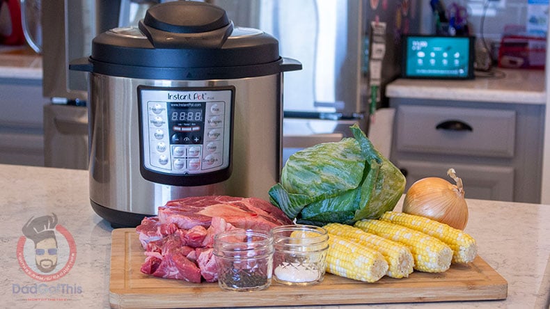 An Instant Pot with the Ingredients for beef bulalo in front of it.