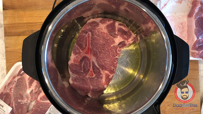 A pork blade steak in an instant pot