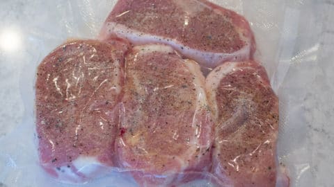 Pork chops sealed in a vacuum bag