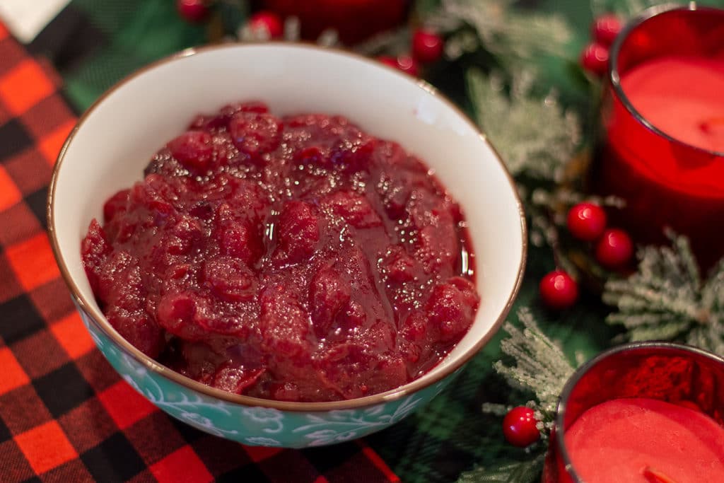 Cranberry Sauce in a bowl with festive decor