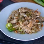 Pancit Bihon on a plate with calamansi