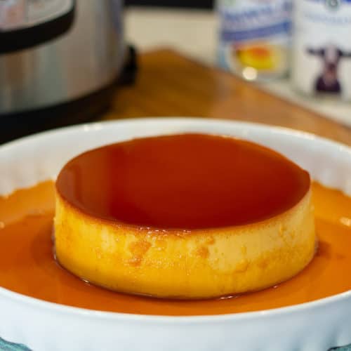 a leche flan in a plate on a counter