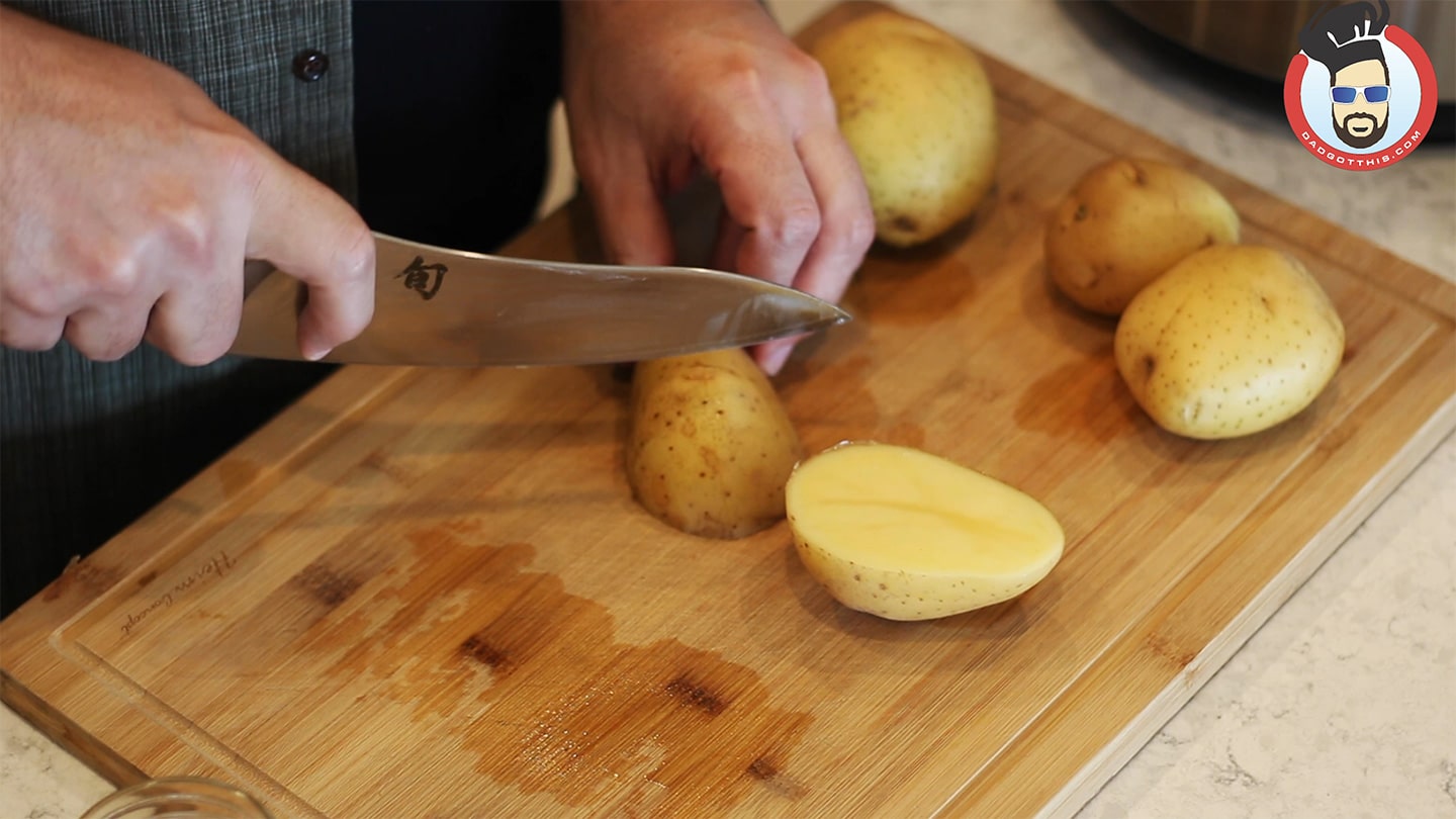 chopping potatoes for zuppa toscana