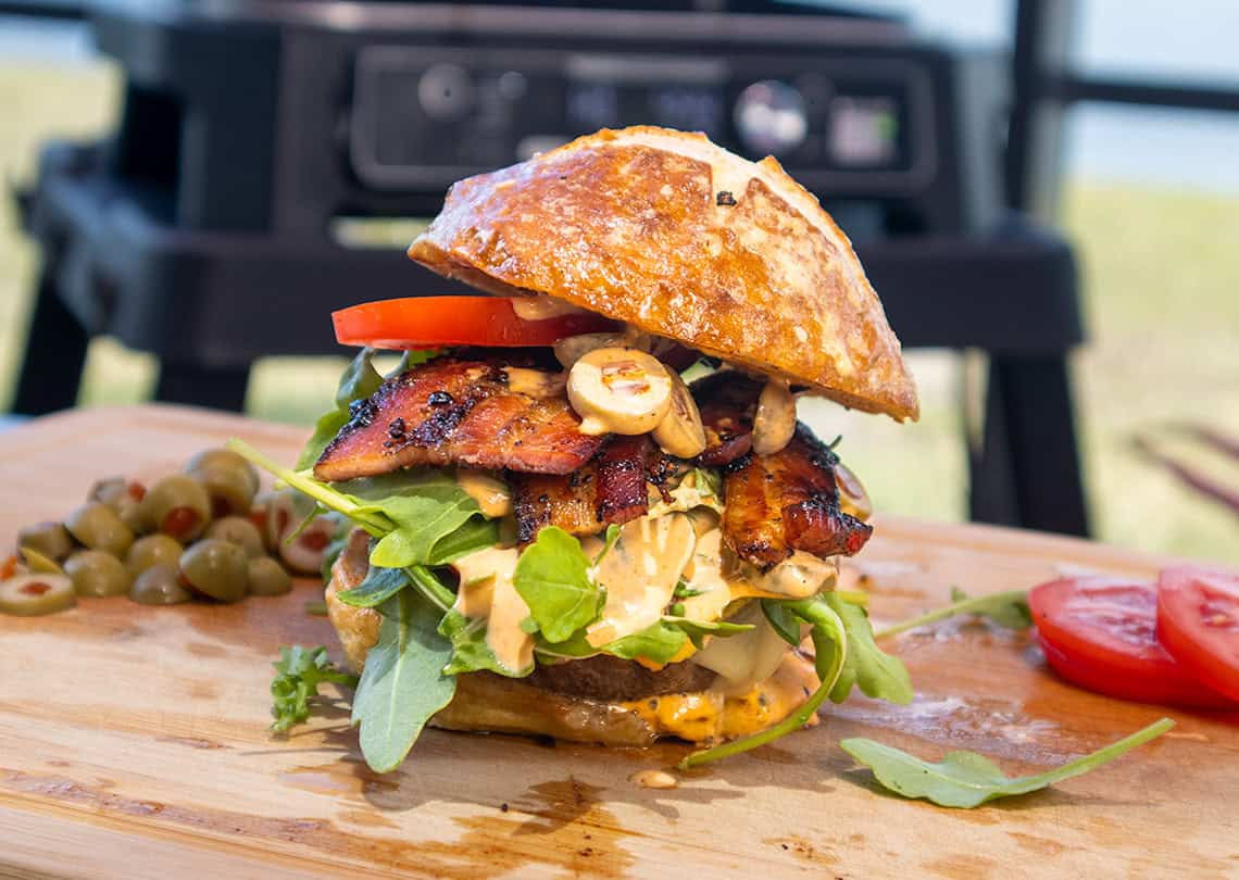 Giant Buffalo Burger on a Cutting Board