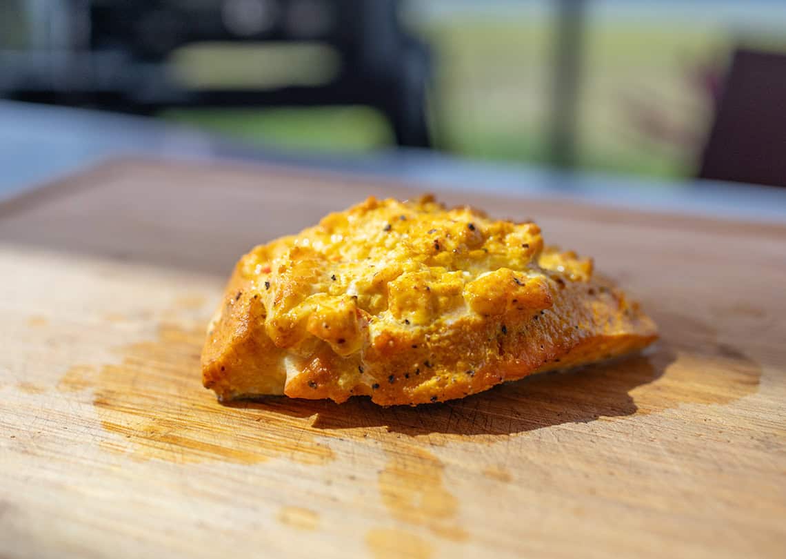 Ninja Woodfire Smoked Salmon on a cutting board.