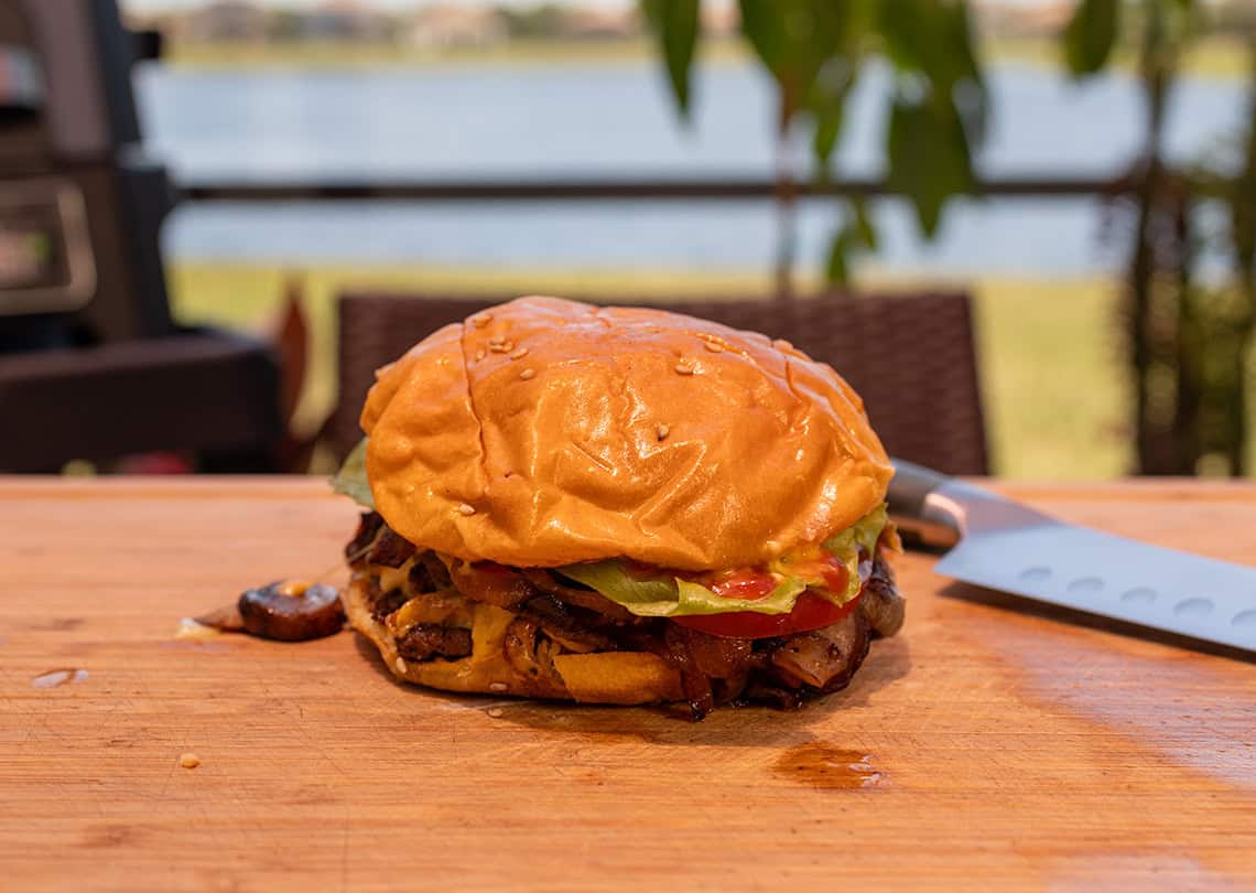 5 guys Copycat Burger on a cutting board.