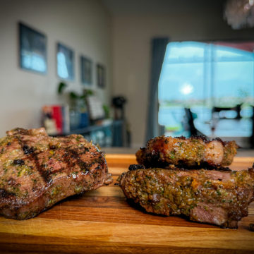 Grilled Lamb Chops on a cutting board.