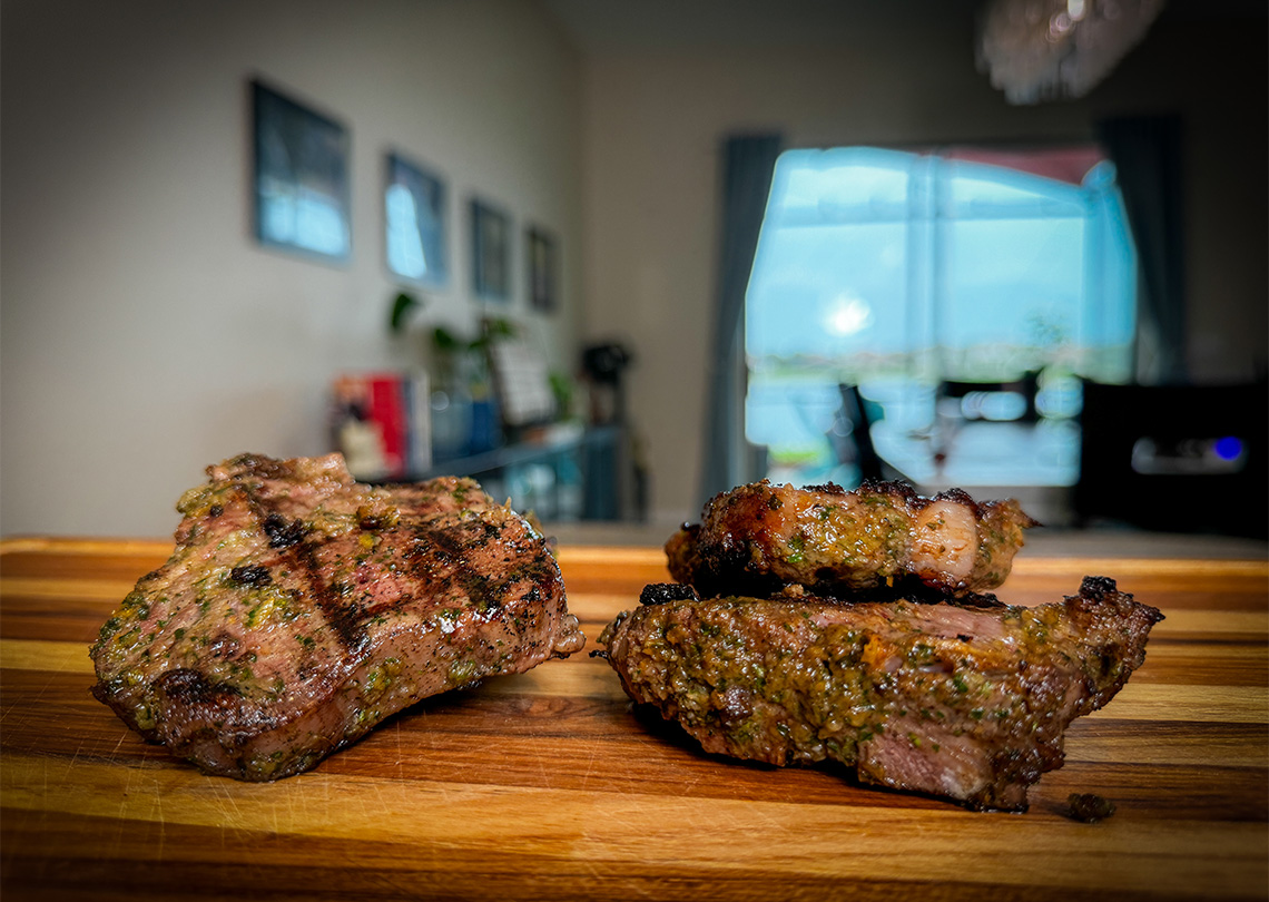 Grilled Lamb Chops on a cutting board.