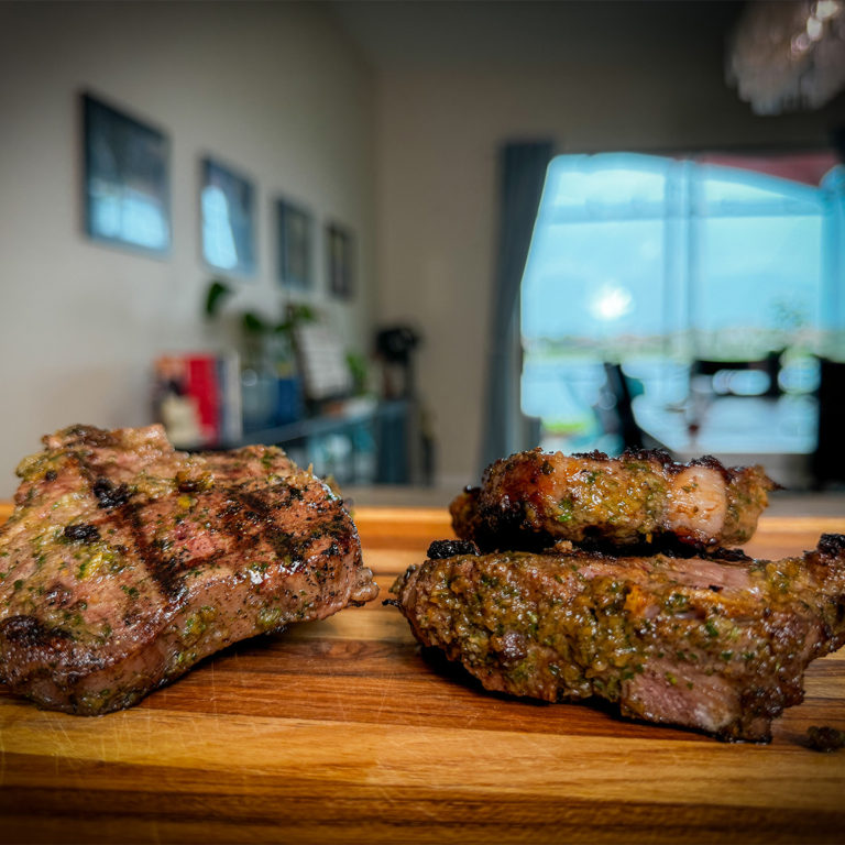 Grilled Lamb Chops on a cutting board.