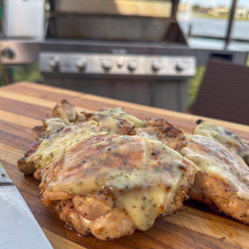 Grilled Chicken Thighs with Lemon Garlic Parsley Sauce.