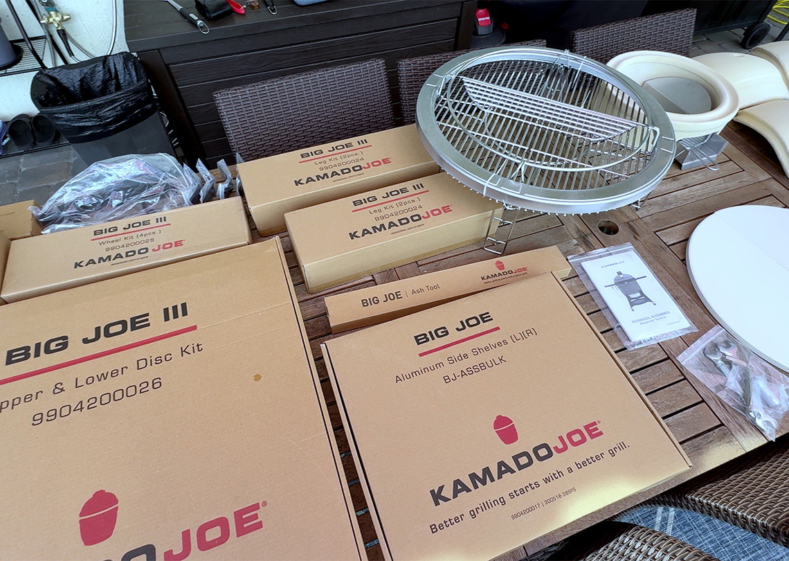 Kamado Joe Big Joe Series III parts on a table.