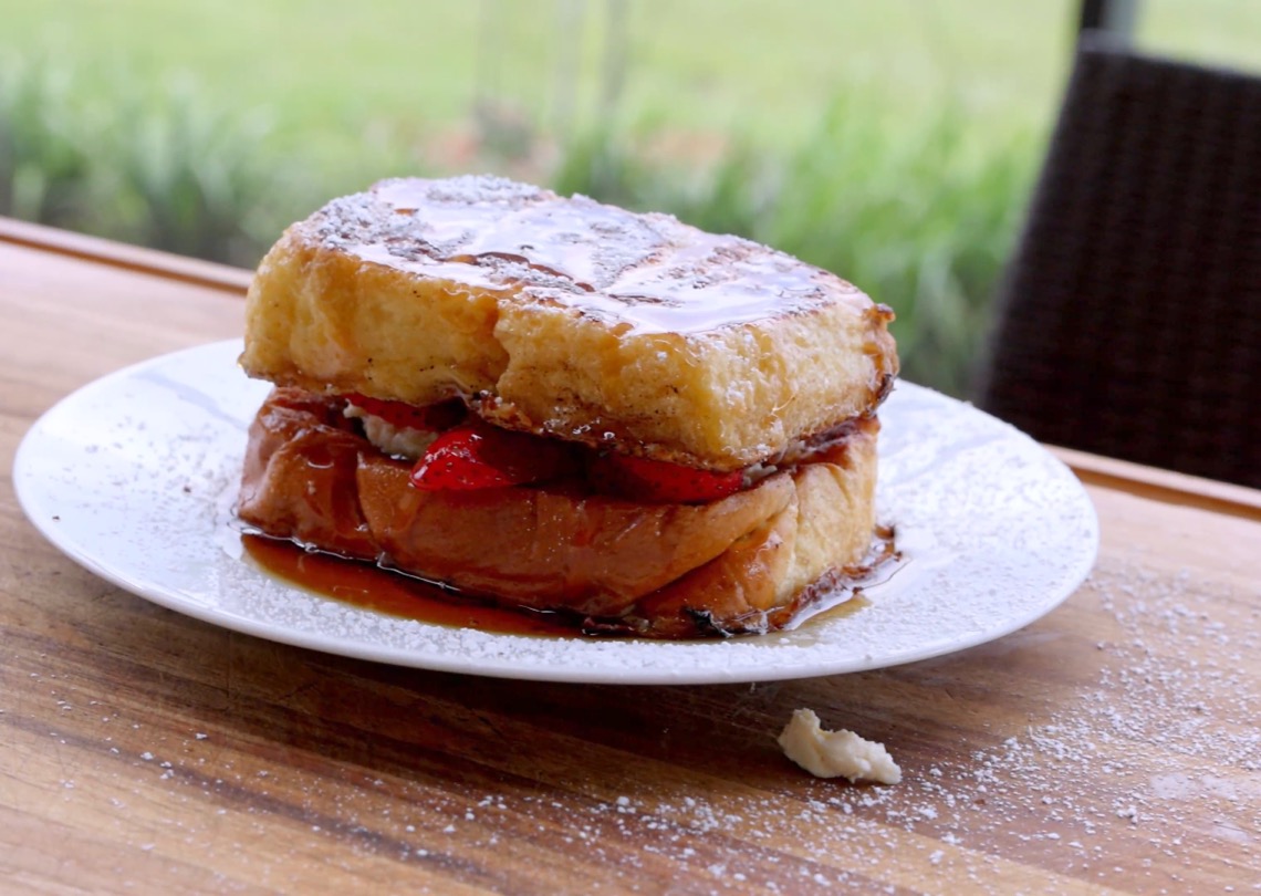 Smoked French Toast with cream cheese strawberries and maple syrup
