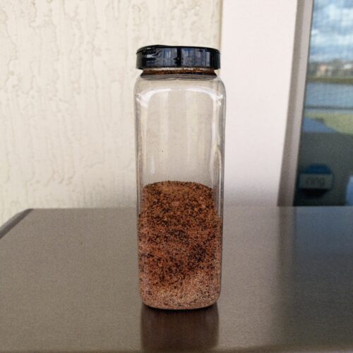 Dad Rub 1.3 Salt Free BBQ Rub in a clear spice shaker